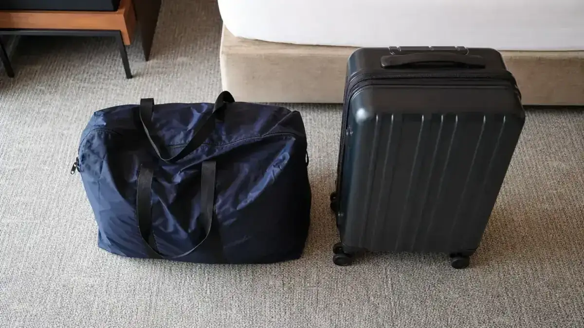 Gonex Packable Duffel vs Away Carry-On: When the Cheap Bag Wins